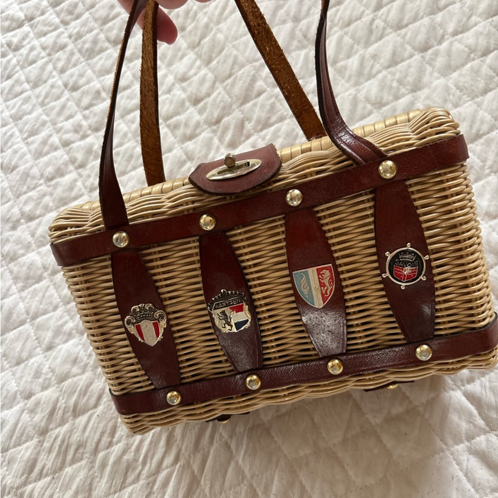 Vintage Woven Rattan Tote with Brown Leather Straps and Crest Accents
